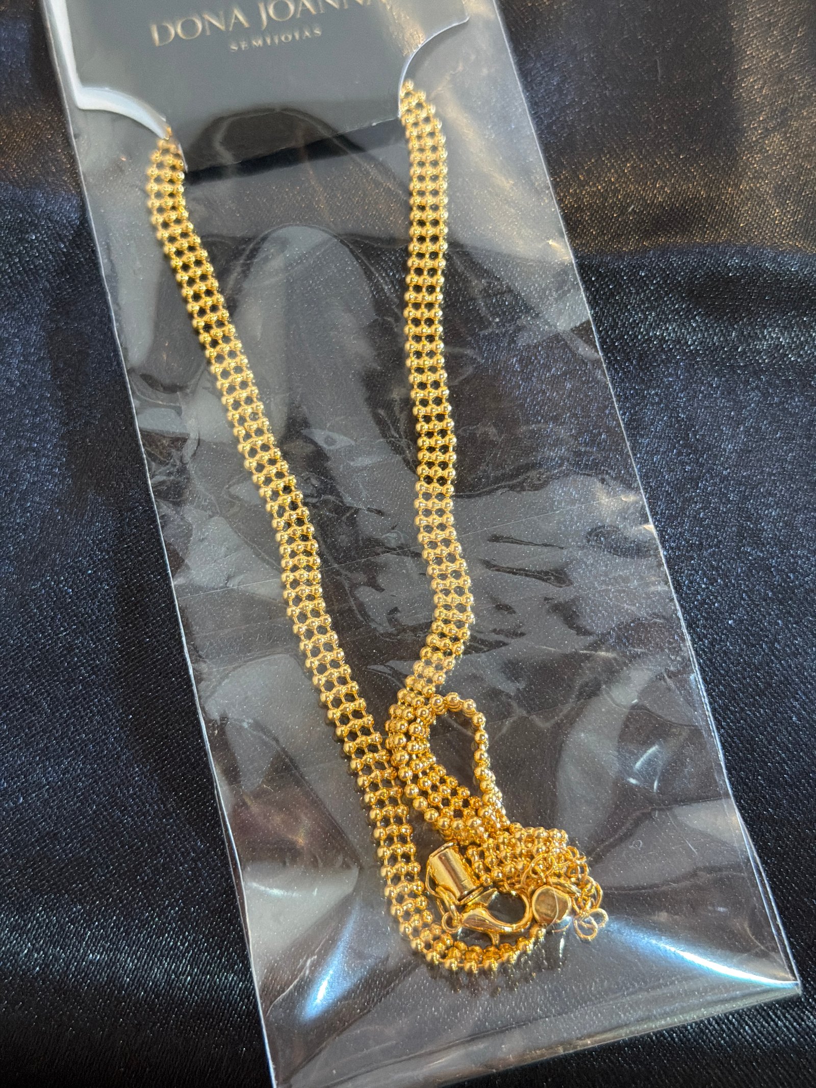 Chocker detalhe G